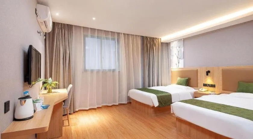 Bed in GreenTree Inn Shanghai Jiading Anting Motor City Express Hotel