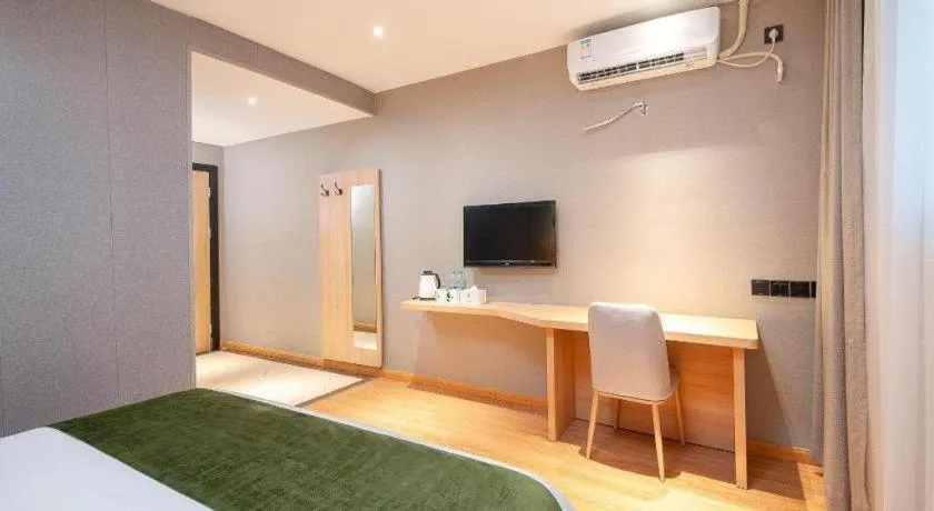 Bed in GreenTree Inn Shanghai Jiading Anting Motor City Express Hotel