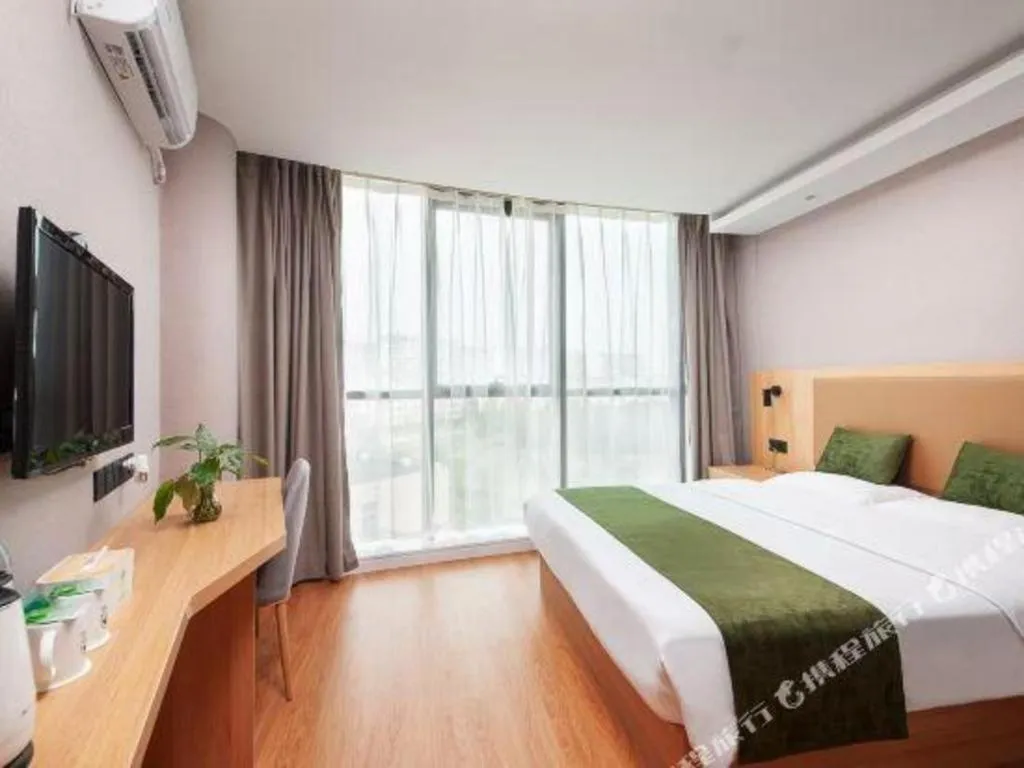 Bed in GreenTree Inn Shanghai Jiading Anting Motor City Express Hotel