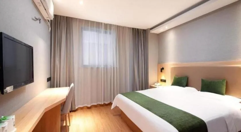 Bed in GreenTree Inn Shanghai Jiading Anting Motor City Express Hotel