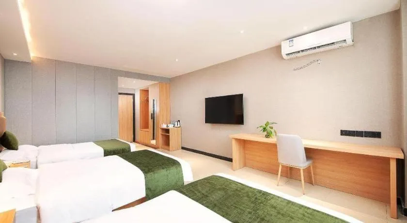 Bed in GreenTree Inn Shanghai Jiading Anting Motor City Express Hotel