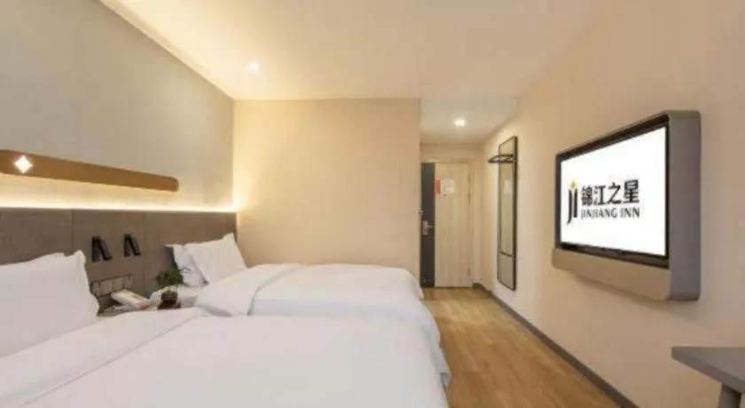 Bed in Jinjiang Inn Hangzhou Lin'an Qianwang Street