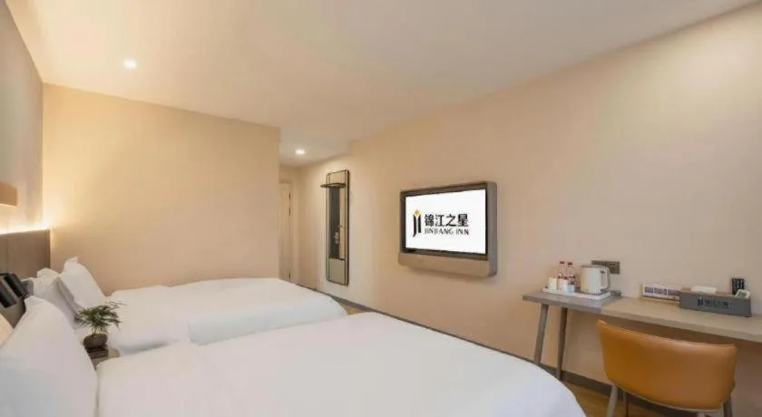 Bed in Jinjiang Inn Hangzhou Lin'an Qianwang Street