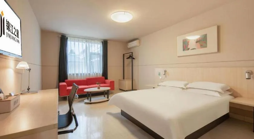 Bed in Jinjiang Inn Hangzhou Lin'an Qianwang Street