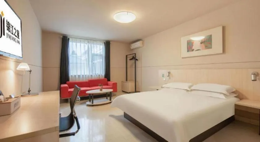 Bed in Jinjiang Inn Hangzhou Lin'an Qianwang Street