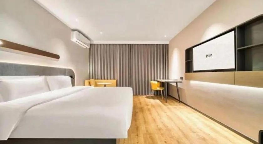 Bed in Jinjiang Inn Hangzhou Lin'an Qianwang Street