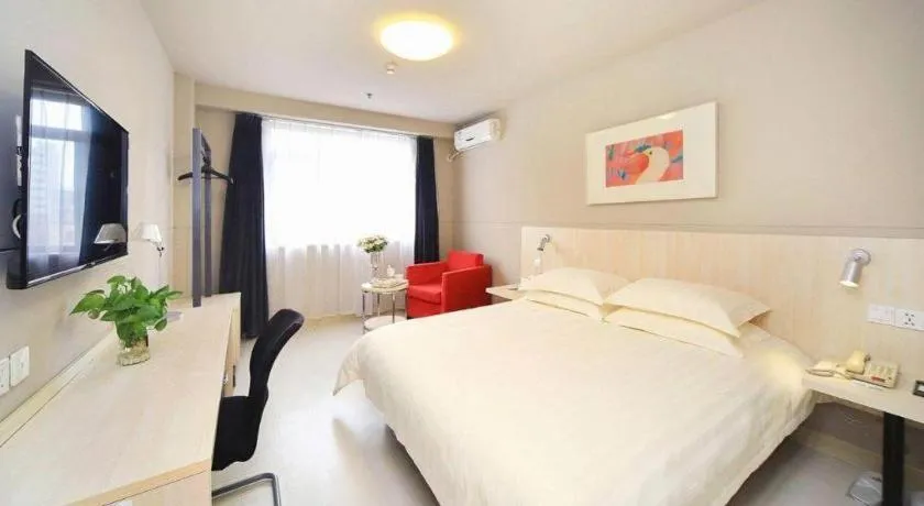 Bed in Jinjiang Inn Hangzhou Lin'an Qianwang Street