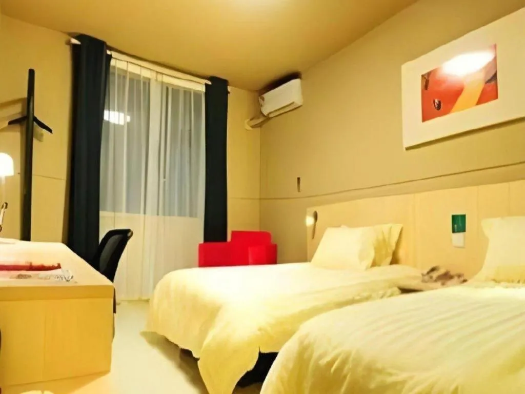 Bed in Jinjiang Inn Hangzhou Lin'an Qianwang Street