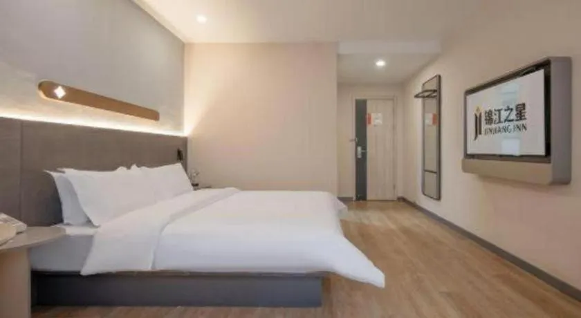 Bed in Jinjiang Inn Hangzhou Lin'an Qianwang Street