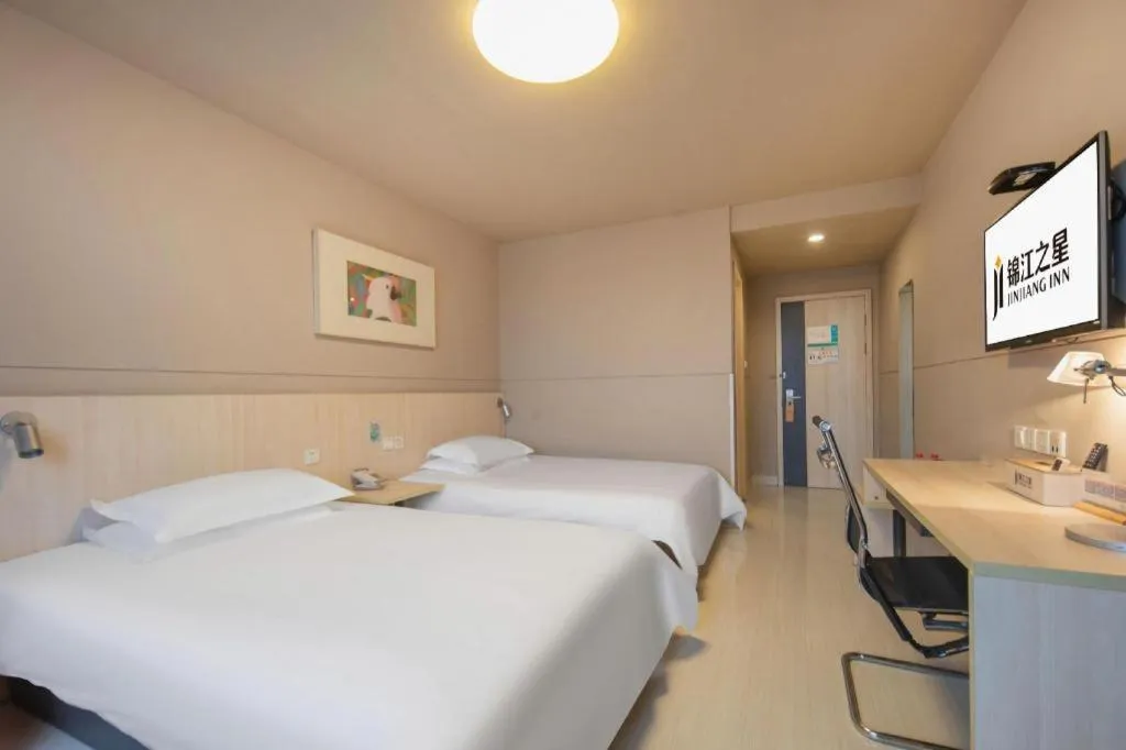 Bed in Jinjiang Inn Hangzhou Lin'an Qianwang Street