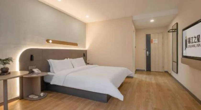 Bed in Jinjiang Inn Hangzhou Lin'an Qianwang Street