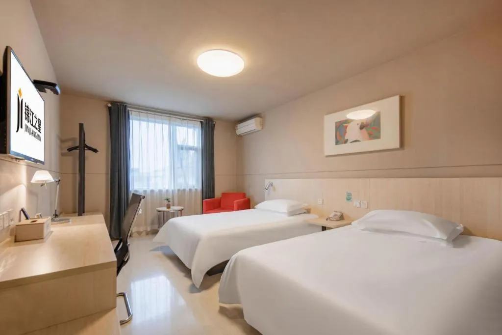 Bed in Jinjiang Inn Hangzhou Lin'an Qianwang Street