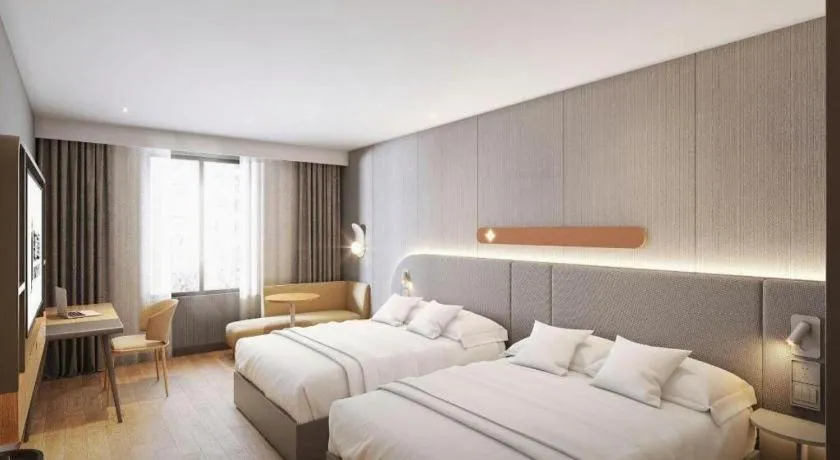 Bed in Jinjiang Inn Hangzhou Lin'an Qianwang Street