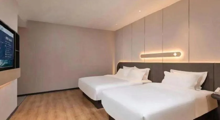 Bed in Jinjiang Inn Hangzhou Lin'an Qianwang Street