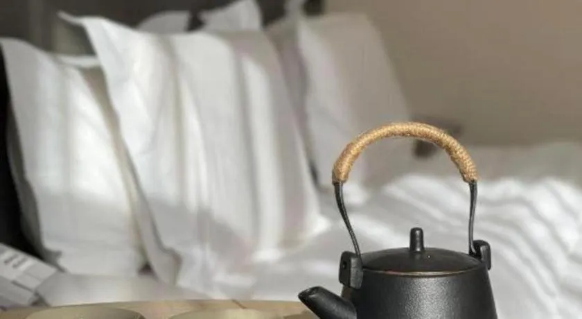 Bed in Jinjiang Inn Hangzhou Lin'an Qianwang Street