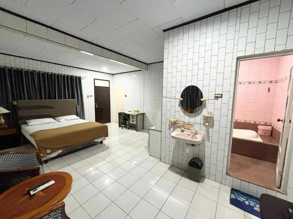 Bed in Sumber Ria Hotel