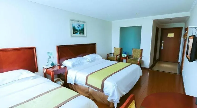 Bed in GreenTree Inn Jiaxing Zhongan Business Hotel