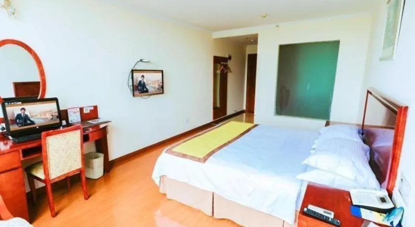 Bed in GreenTree Inn Jiaxing Zhongan Business Hotel