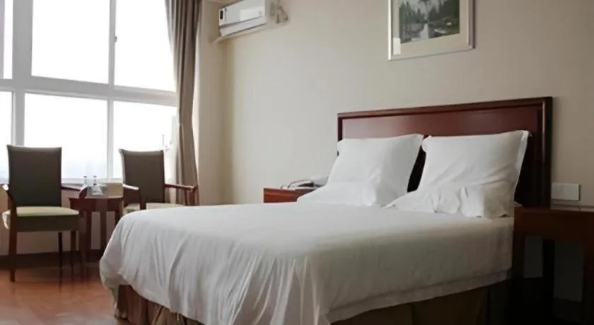Bed in GreenTree Inn Jiaxing Zhongan Business Hotel