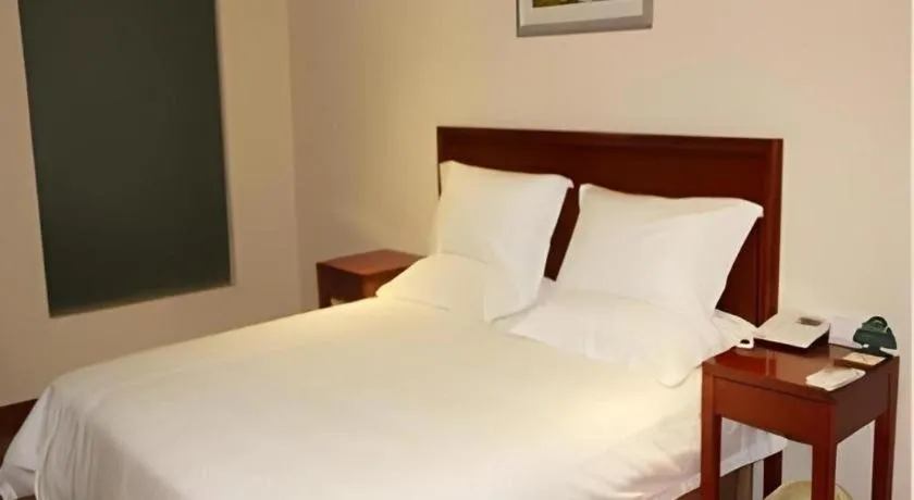 Bed in GreenTree Inn Jiaxing Zhongan Business Hotel