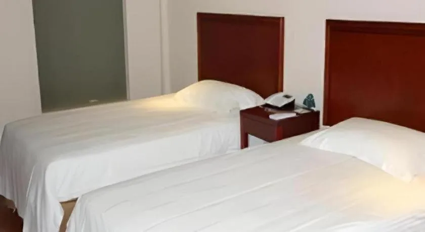 Bed in GreenTree Inn Jiaxing Zhongan Business Hotel