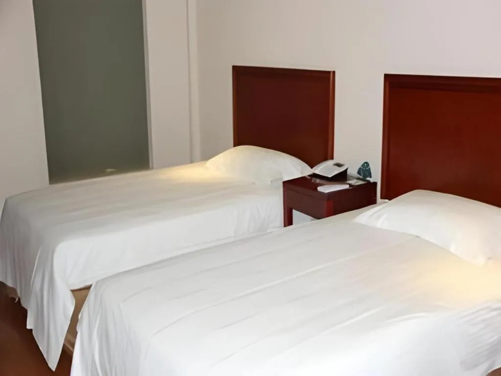 Bed in GreenTree Inn Jiaxing Zhongan Business Hotel
