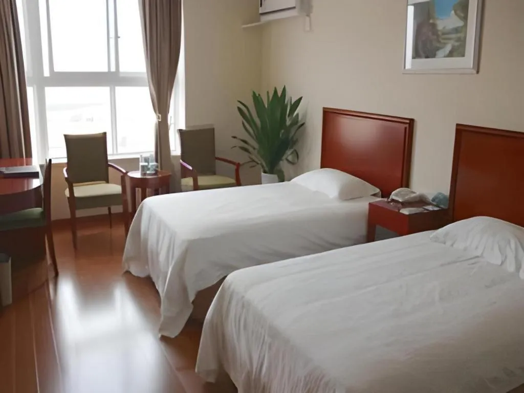 Bed in GreenTree Inn Jiaxing Zhongan Business Hotel