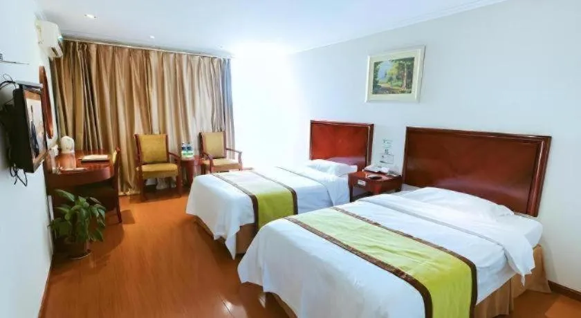 Bed in GreenTree Inn Jiaxing Zhongan Business Hotel
