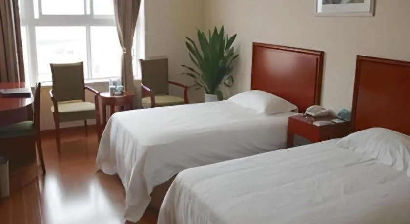 Bed in GreenTree Inn Jiaxing Zhongan Business Hotel