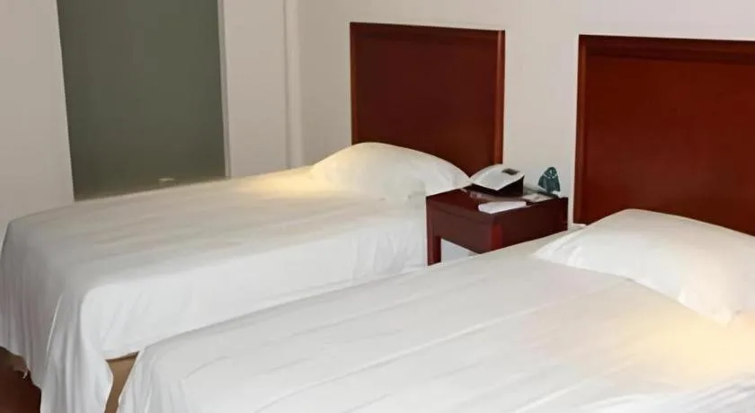 Bed in GreenTree Inn Jiaxing Zhongan Business Hotel