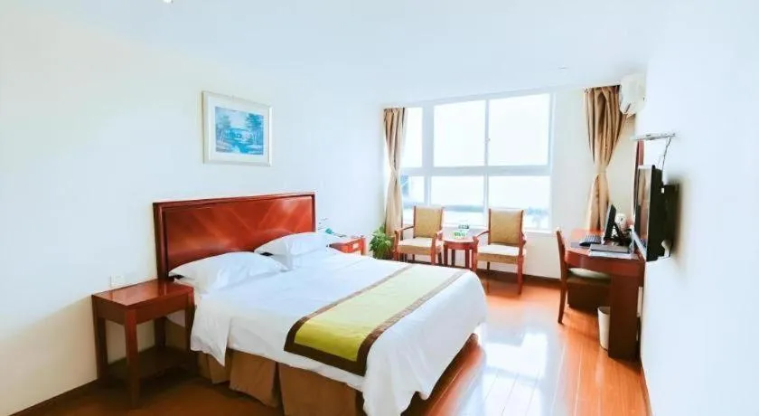 Bed in GreenTree Inn Jiaxing Zhongan Business Hotel