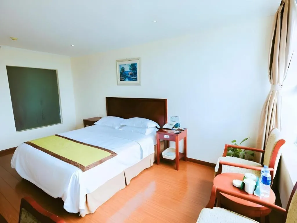 Bed in GreenTree Inn Jiaxing Zhongan Business Hotel