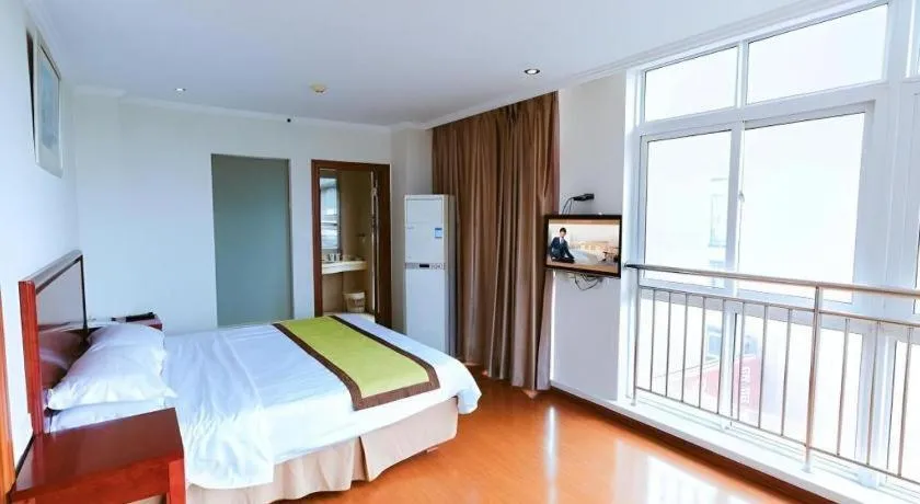 Bed in GreenTree Inn Jiaxing Zhongan Business Hotel