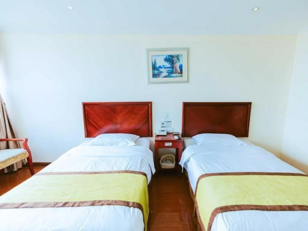 Bed in GreenTree Inn Jiaxing Zhongan Business Hotel