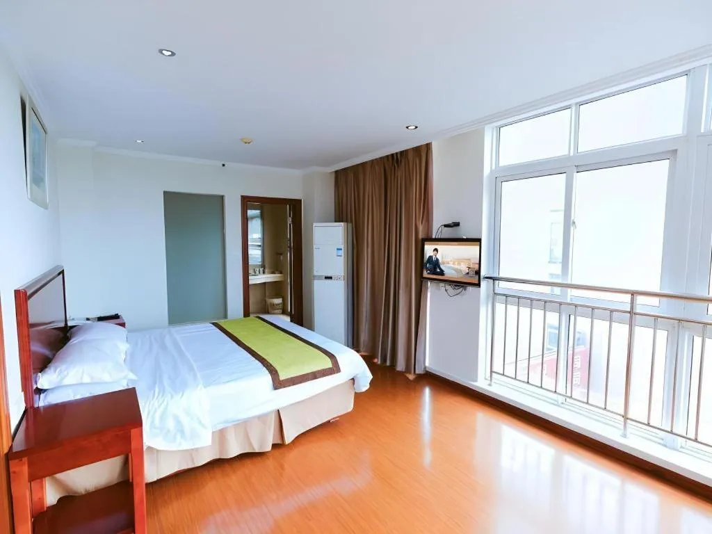 Bed in GreenTree Inn Jiaxing Zhongan Business Hotel