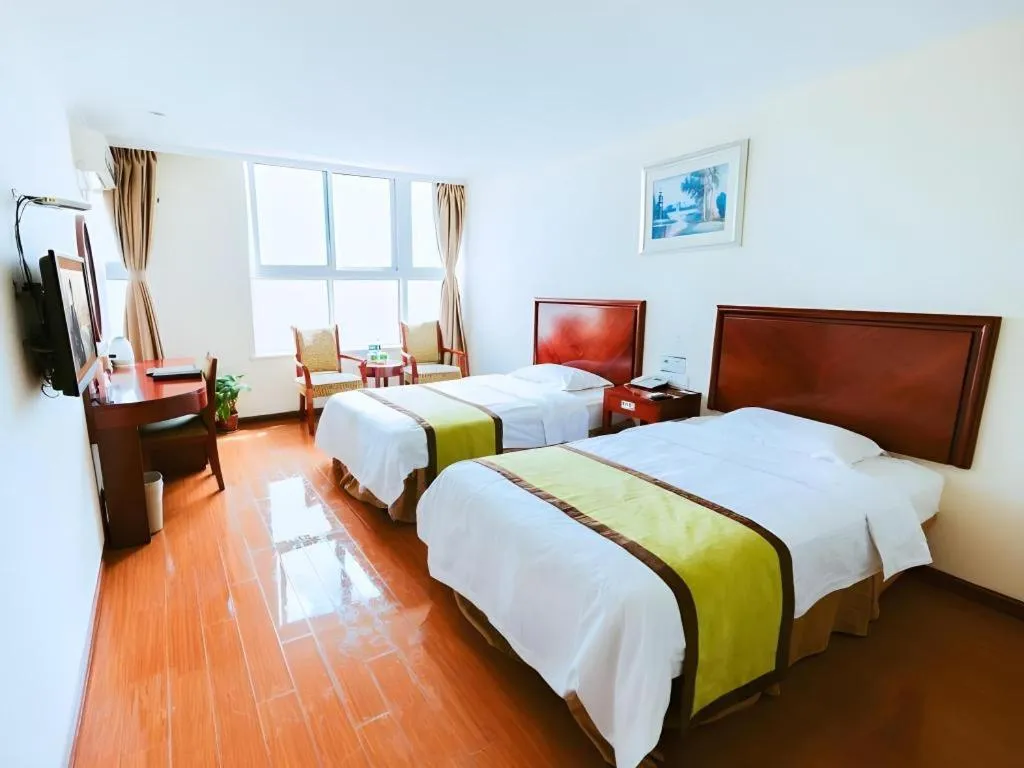 Bed in GreenTree Inn Jiaxing Zhongan Business Hotel
