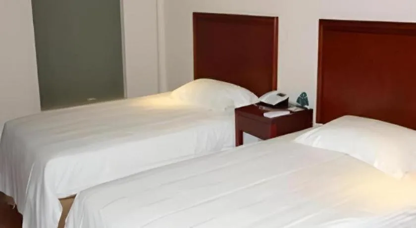 Bed in GreenTree Inn Jiaxing Zhongan Business Hotel