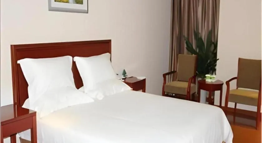 Bed in GreenTree Inn Jiaxing Zhongan Business Hotel