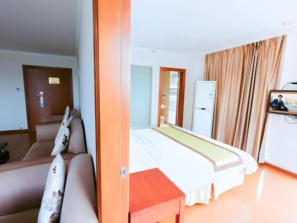 Bed in GreenTree Inn Jiaxing Zhongan Business Hotel