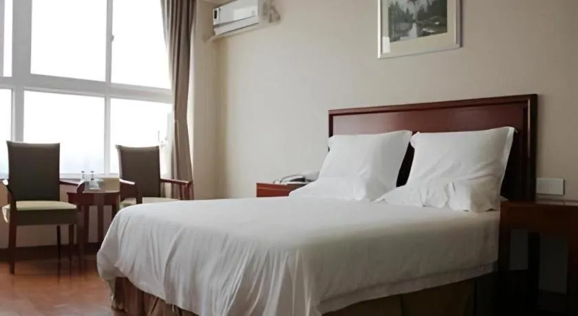 Bed in GreenTree Inn Jiaxing Zhongan Business Hotel