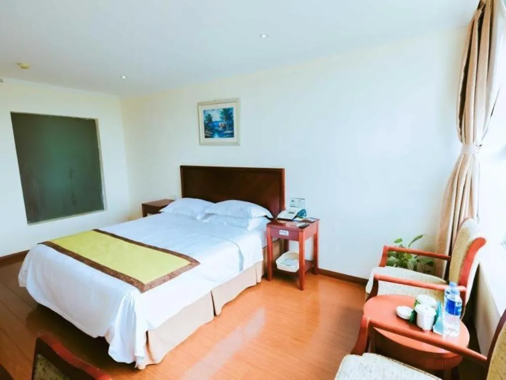 Bed in GreenTree Inn Jiaxing Zhongan Business Hotel