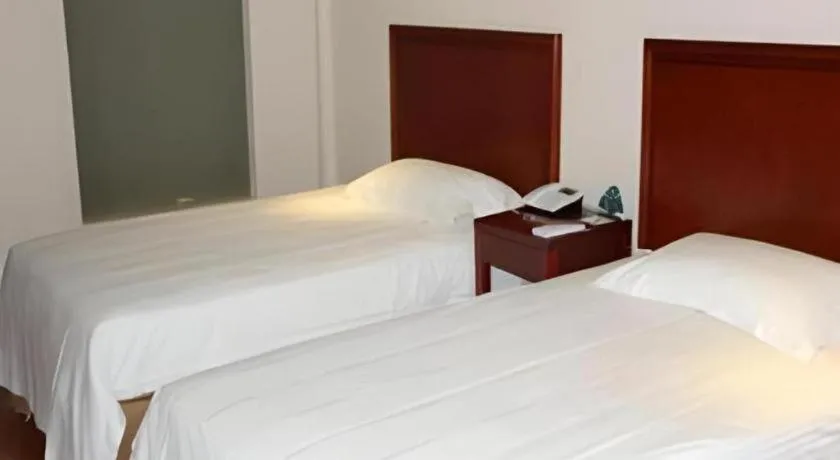 Bed in GreenTree Inn Jiaxing Zhongan Business Hotel