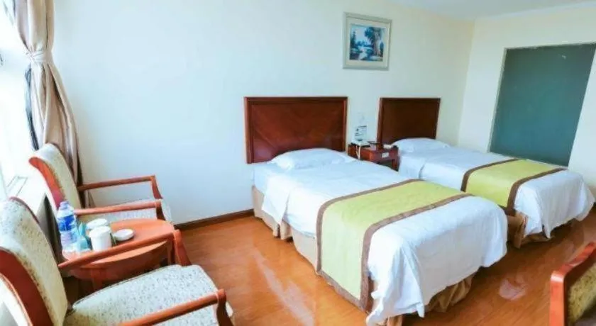 Bed in GreenTree Inn Jiaxing Zhongan Business Hotel