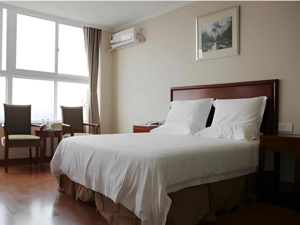 Bed in GreenTree Inn Jiaxing Zhongan Business Hotel
