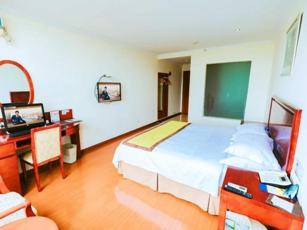 Bed in GreenTree Inn Jiaxing Zhongan Business Hotel