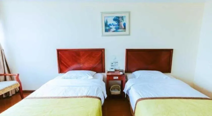 Bed in GreenTree Inn Jiaxing Zhongan Business Hotel