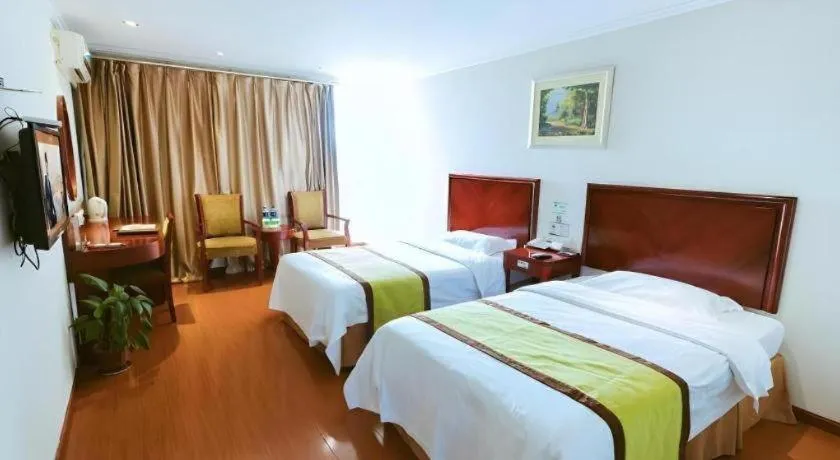 Bed in GreenTree Inn Jiaxing Zhongan Business Hotel