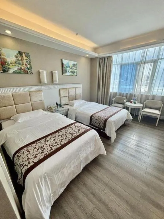Bed in GreenTree Inn Guangdong Huizhou Chenjiang Intercity Rail Station Business Hotel