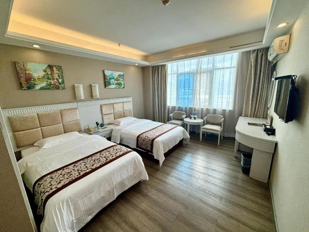 Bed in GreenTree Inn Guangdong Huizhou Chenjiang Intercity Rail Station Business Hotel