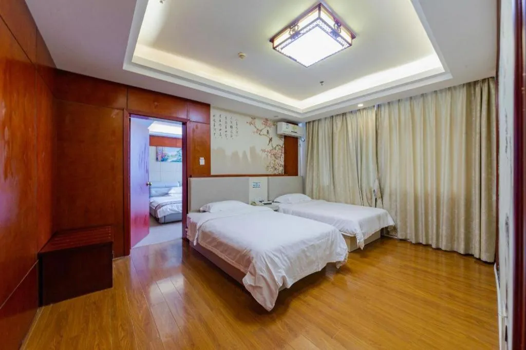 Bed in GreenTree Inn Guangdong Huizhou Chenjiang Intercity Rail Station Business Hotel